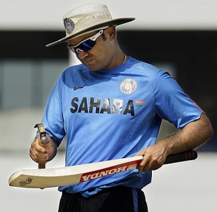 Virender Sehwag prepares his bat for another onslaught, Nagpur, December 17, 2009