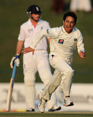Saeed Ajmal races off in celebration of his third wicket, Pakistan v England, 2nd Test, Abu Dhabi, 2nd day, January 26, 2012