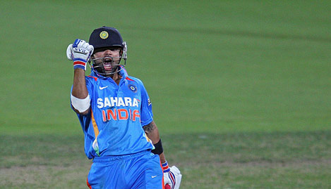 Virat Kohli is ecstatic after completing his century