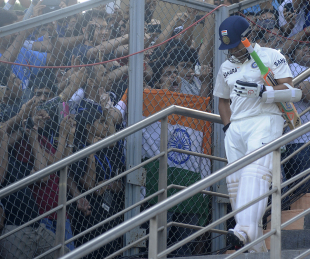Sachin Tendulkar walks down the pavilion on the second morning, India v West Indies, 2nd Test, Mumbai, 2nd day, November 15, 2013
