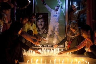 Candles are lit to pay tribute to Phillip Hughes in Karachi, Karachi, November 27, 2014