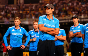 Alastair Cook and his team-mates look dejected after the series loss, Sri Lanka v England, 7th ODI, Colombo, December 16, 2014