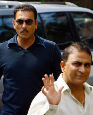 Former India captains Ravi Shastri and Sunil Gavaskar arrive at the BCCI headquarters for a meeting to find reasons for India's World Cup debacle